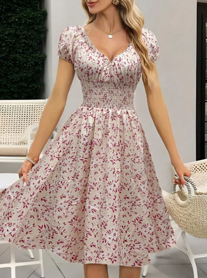 Vintage bloemenjurk met pluizige manchetten en geplooide taille, geschikt voor zomerse strandkleding voor dames en zomerfeesten