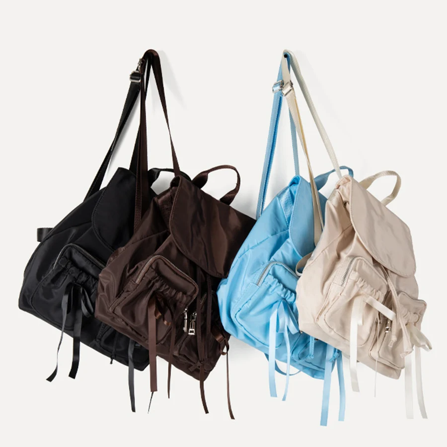 Korean version InS-style cute bow backpack,lightweight and large-capacity nylon canvas flip-top backpack for commuting travel