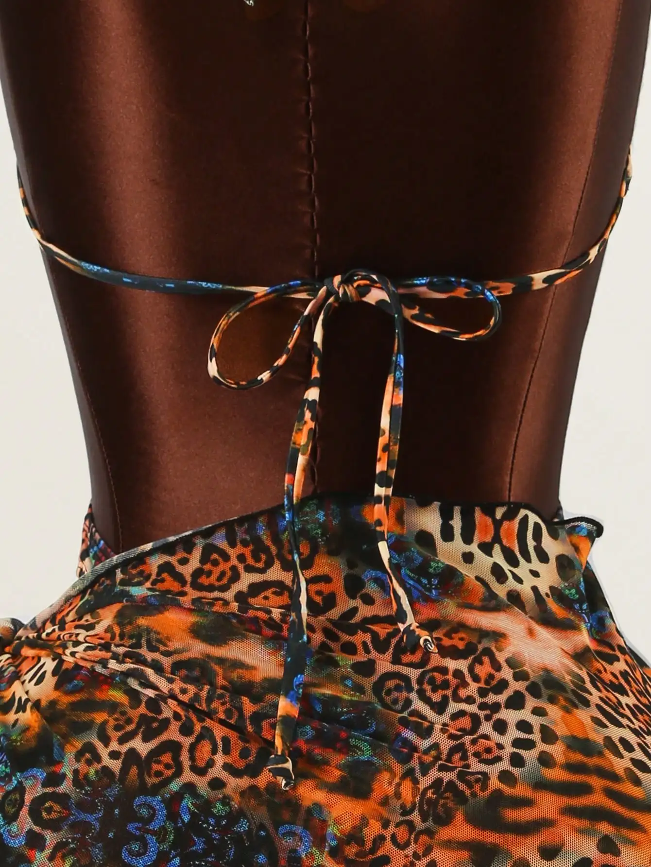 

Two-Piece Cheetah Print Cut-Out Ring Bikini With Sheer Cover-Up Skirt For Summer Beach Outfit