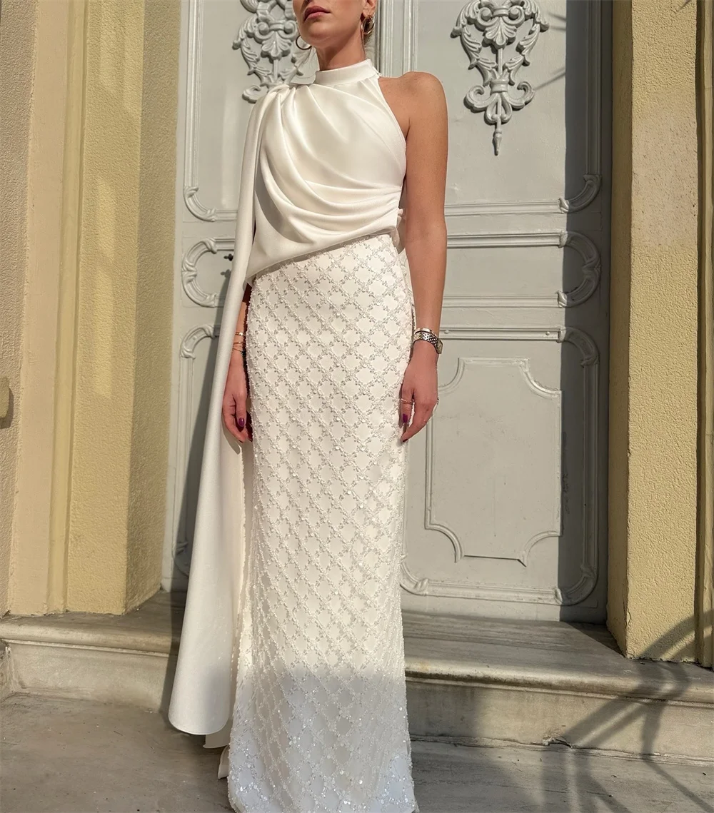فستان كاثي مخصص لامع أبيض للحفلات الراقصة الرسمية برقبة رسن فيستدوس دي نويفا مع ذيل بطول الأرض فساتين سهرة 2025