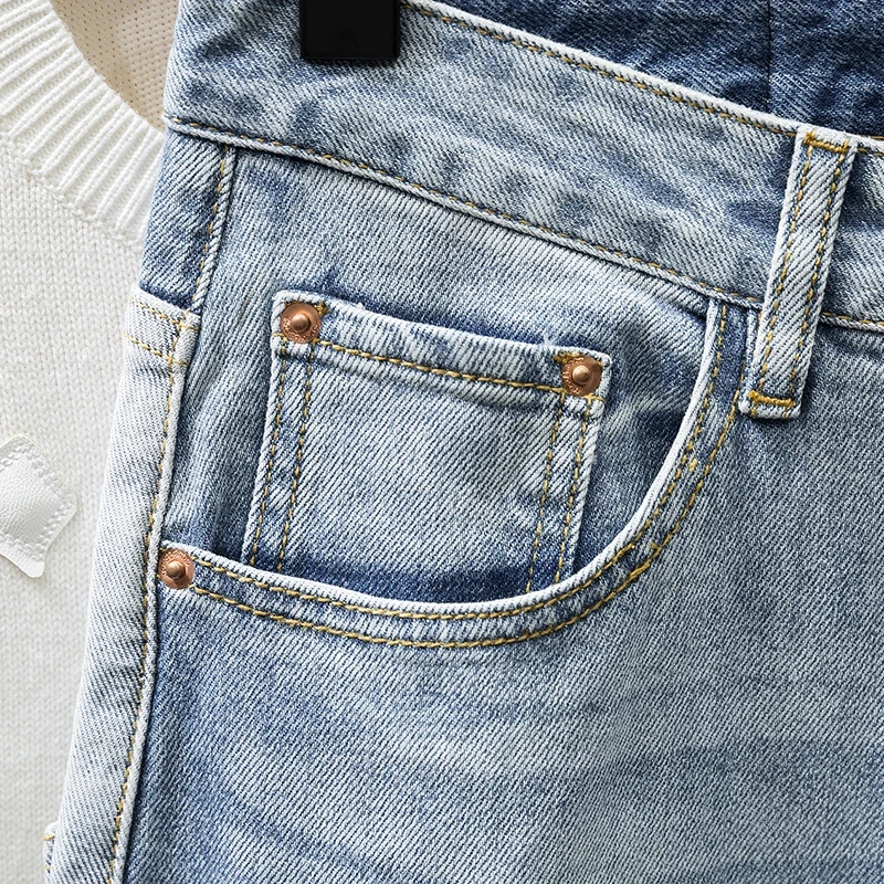 Pantalones vaqueros ajustados de moda coreana para hombre, pantalones de Hip-hop con empalme de bolsillo azul claro, ropa de calle personalizada, pantalones vaqueros elásticos