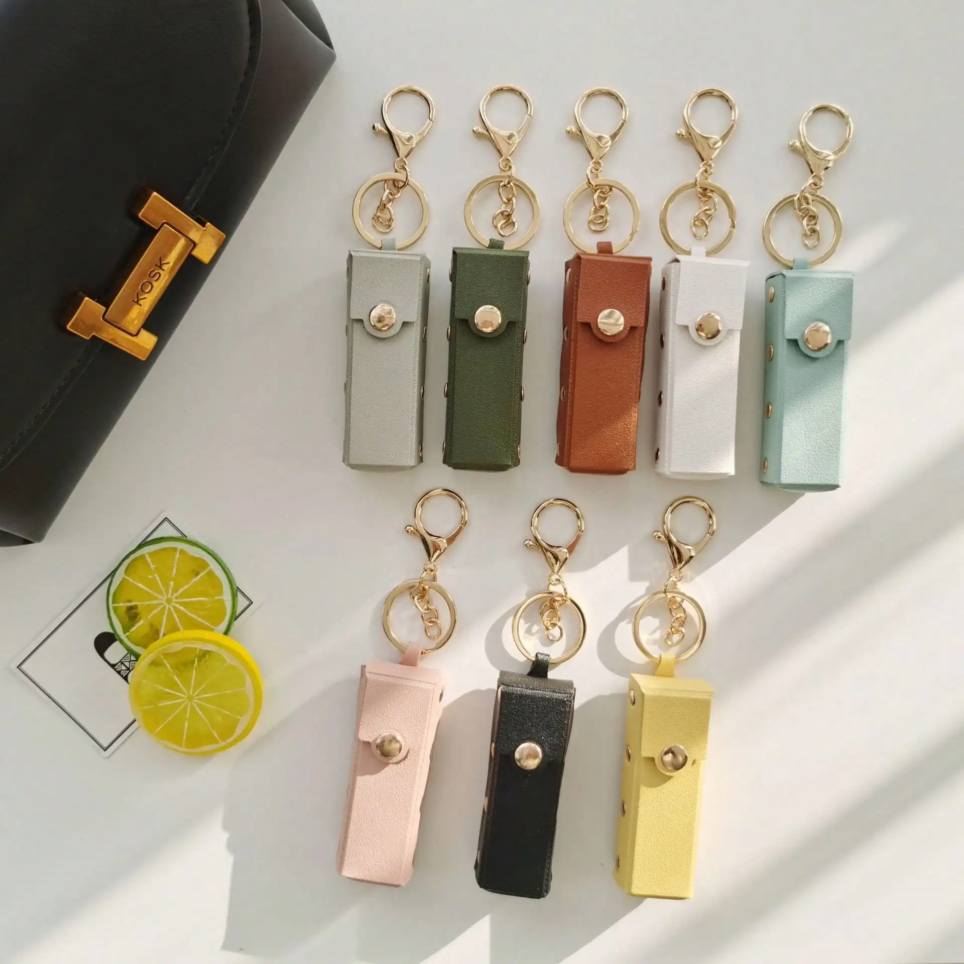 

1pc Solid Color Cute Street Style Zinc Alloy Keychain, PU Leather Lip Gloss Bag Charm Accessory