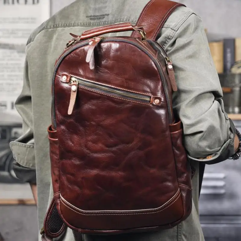 PNDME stilisti fatti a mano in vera pelle da uomo zaino per laptop di grande capacità zaini da viaggio in pelle di mucca di lusso da viaggio all'aperto