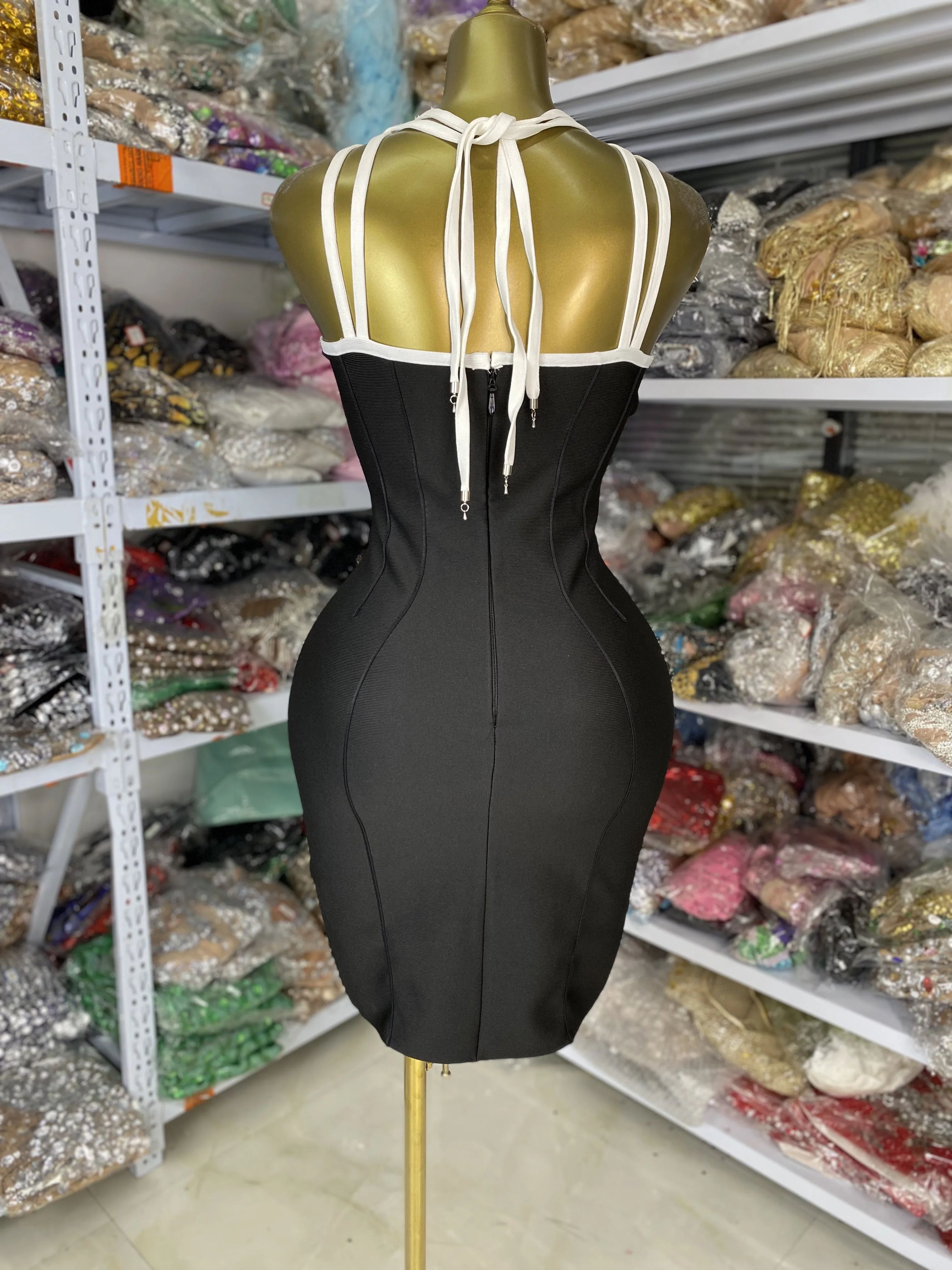 Usine en gros femmes nouvelle robe de pansement noire col croisé moulante Mini élastique tricoté haute rue soirée Club robe de soirée