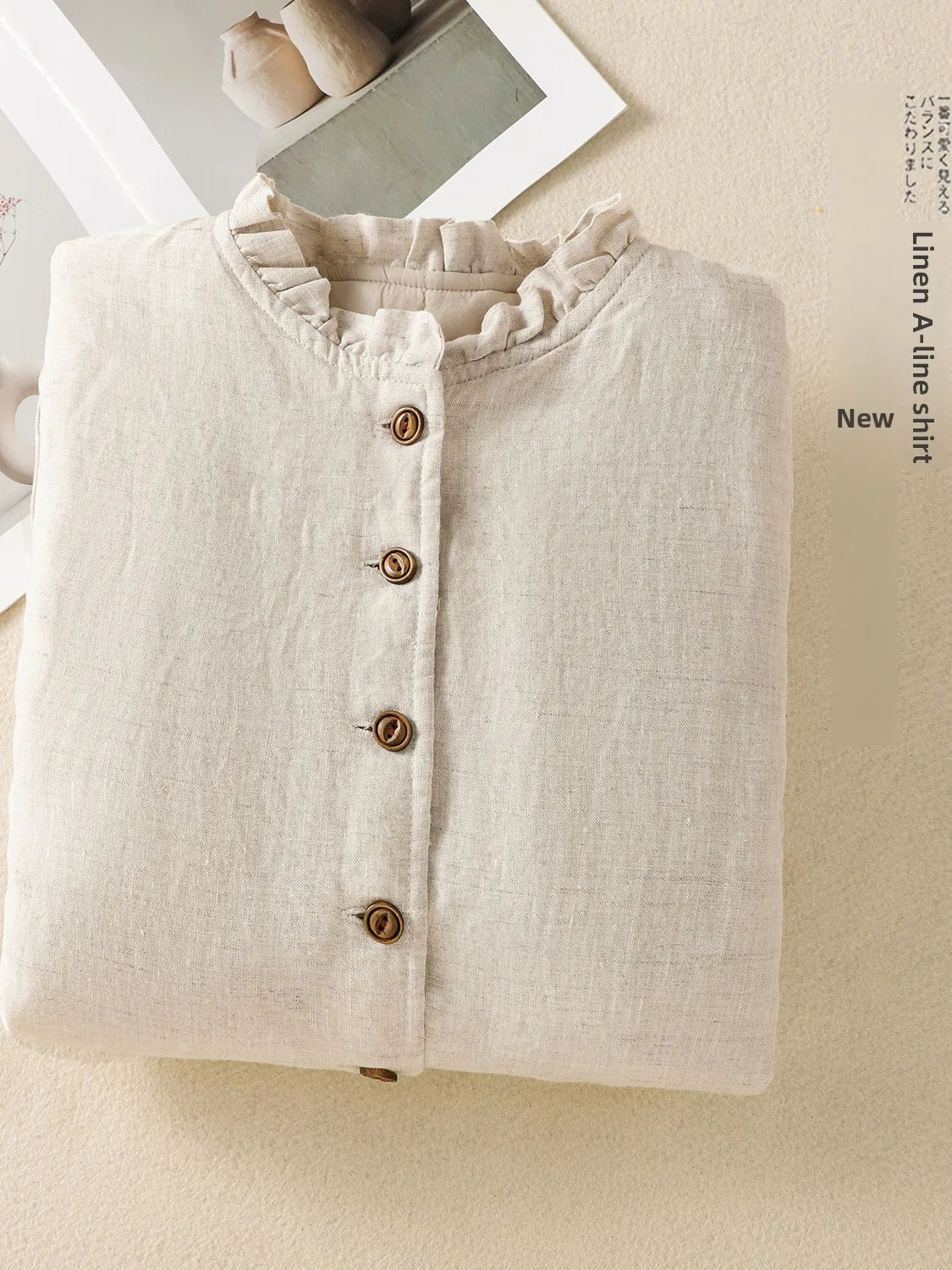 Artystyczny płaszcz z bawełny Sle z drewnianym kołnierzem, jednolity kolor, lniany, zimowy, nowy model, damski, luźny krój, długi płaszcz Sve.