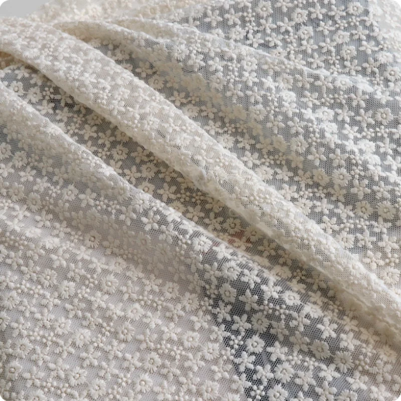 

Beige three-dimensional floral mesh embroidery fabric for winter base shirt,tablecloth, clothing polyester cotton fabric