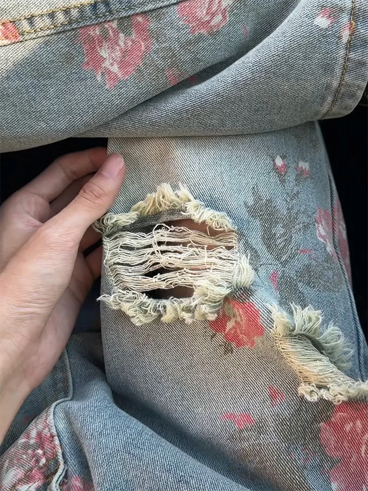 ローズフルプリントリッピングジーンズ女性の夏のスタイリッシュなハイエンドカーブナイフパンツハイストリートストレートレッグマイクロフレアパンツ