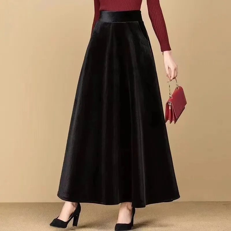 

Women Casual A-line Large Skirts Autumn Ladies High Waist Maxi Skirt Korean Female Large Size 3XL Golden Velvet Long Skirts 2025