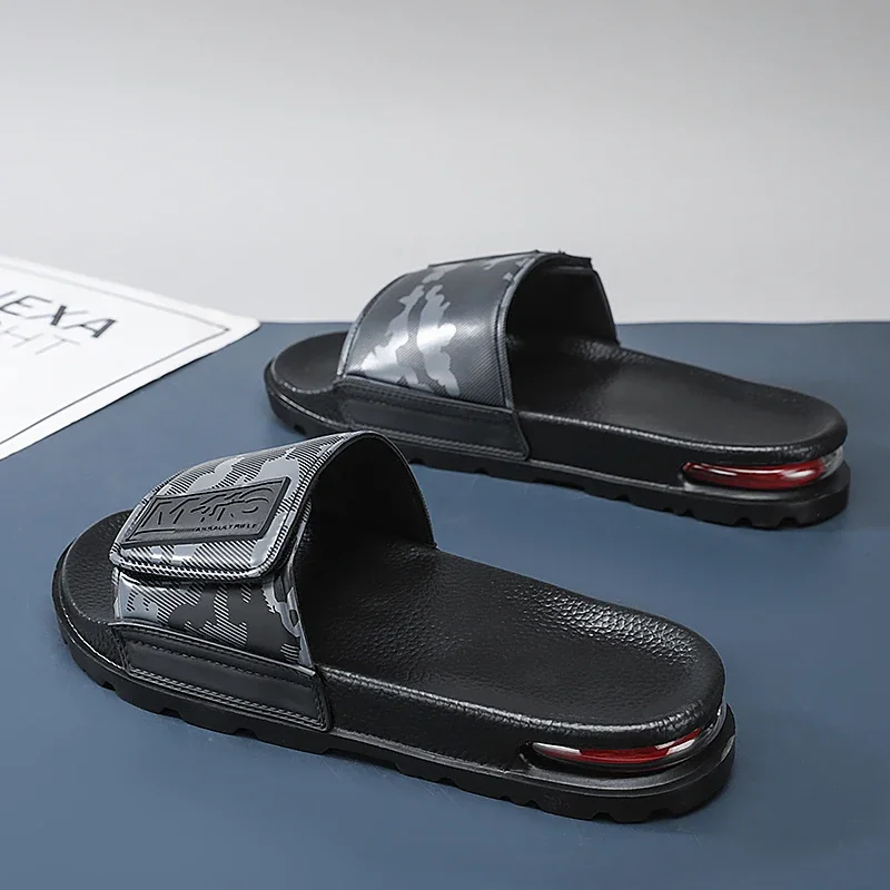 2025 الربيع والصيف الاتجاه ملابس عصرية سوبر لينة النعال الرجال الفيلكرو وسادة هوائية شخصية جميع النعال كلمة واحدة عادية