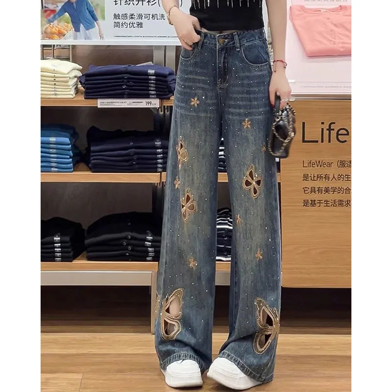 Nuevos pantalones vaqueros con mariposas bordadas caladas para mujer Primavera Verano nuevos pantalones vaqueros ajustados y ajustados de cintura alta a la moda para mujer