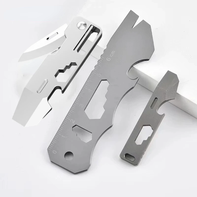 

NEW Outdoors Titanium Alloy Mini Multifunctional Folding Pry Bar Key Screwdriver Pendant Wrench Bottle Opener Express EDC Tool