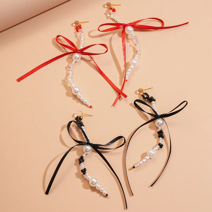 Imitation pearl glass streamer bow fringed silver needle earrings fashion personality niche high-end earrings women