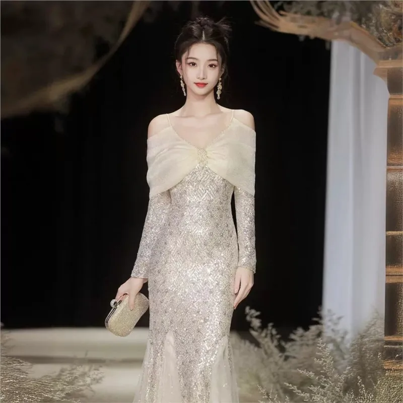 

A new light luxury and niche adult gift dress with cinched waist fishtail sequined skirt from Heavy Industry straps