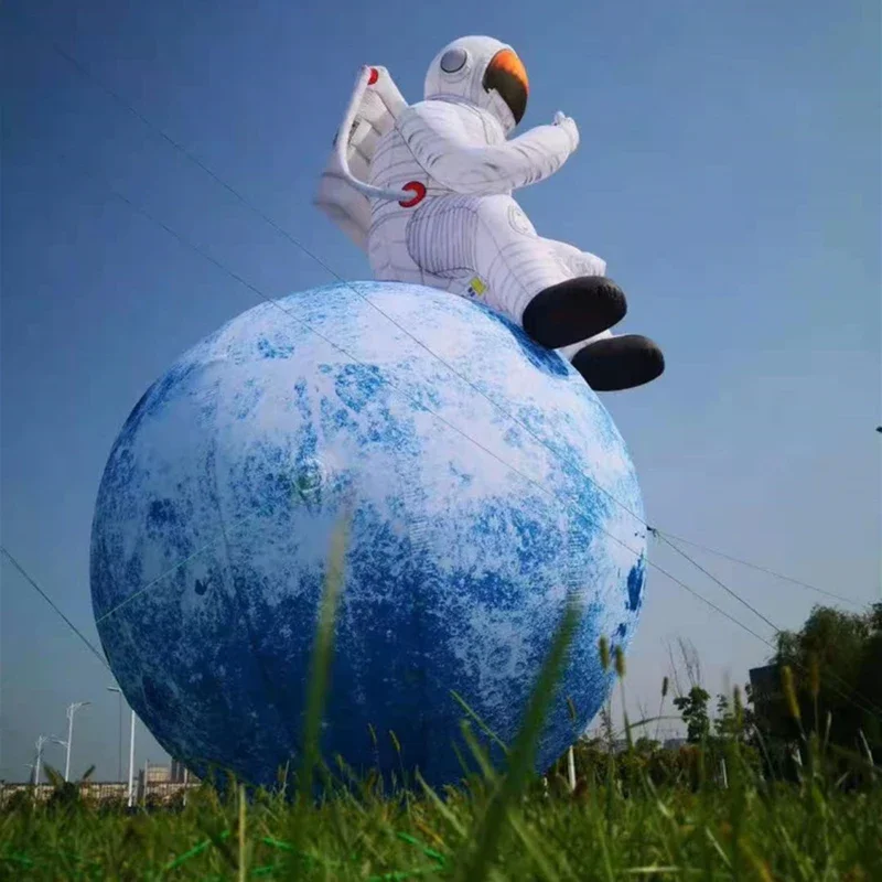 巨大なインフレータブル宇宙飛行士が月に着陸するLEDライト付きコンサート用インフレータブル月ステージ装飾インフレータブル宇宙飛行士月おもちゃ