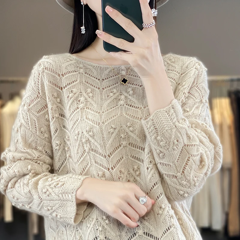 Autumn and winter new O-neck 100% merino wool women's hollow sweater loose fashion Korean high-end knitted bottoming shirt