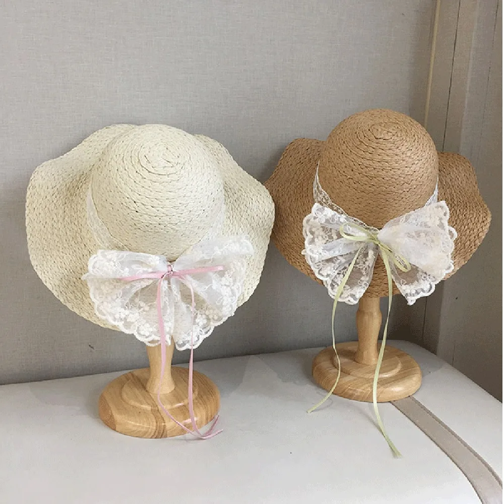 

Solid Color Sweet Bowknot Straw Sun Hat Ribbon Korean Style Girls Bucket Hat Breathable Anti-UV Woven Handbag Kids