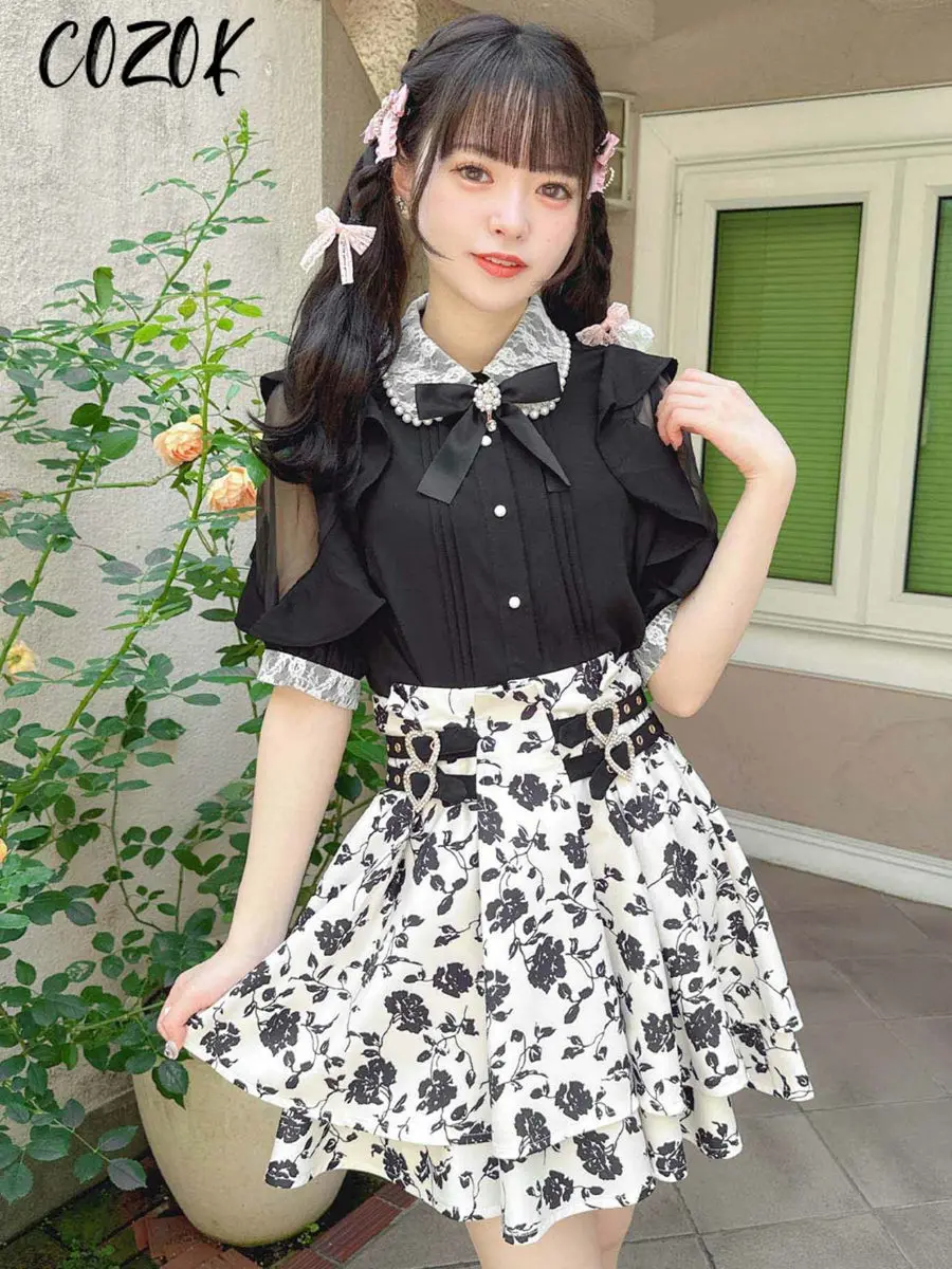 Japonais simple Rojita jupe plissée fille en forme de coeur boucle volants mignon doux JK noir jupes automne taille haute Mini jupe