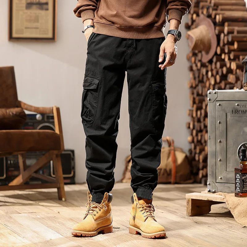 Celana Jogger Multi Saku Warna Solid Trendi Kasual Dasar Pria High Street Fashion Amerika Celana Kargo Pria Pakaian 2025