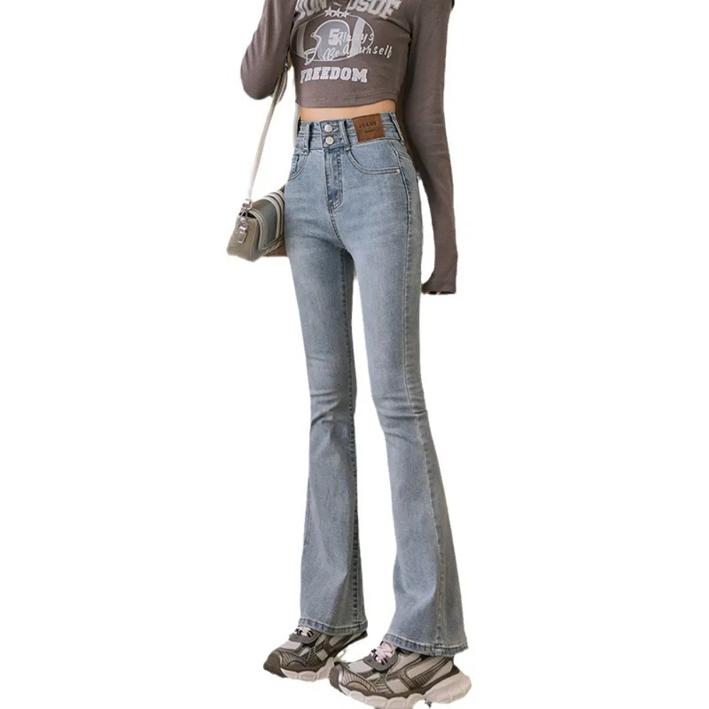 กางเกงยีนส์ทรงบลูมสำหรับผู้หญิง เอวกลาง ทรงบอยเฟรนด์ ผ้ายืด กระดุมผ่าหน้า ทรงบูทคัท ดีไซน์ทันสมัยปี 2025