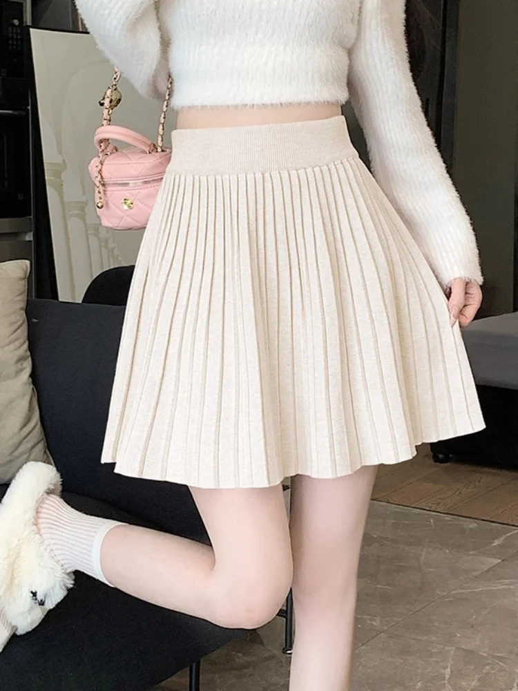 SMTHMA Gonna lavorata a maglia a pieghe calda 2025 Nuova gonna corta a vita alta autunno inverno Gonna a trapezio dimagrante da donna