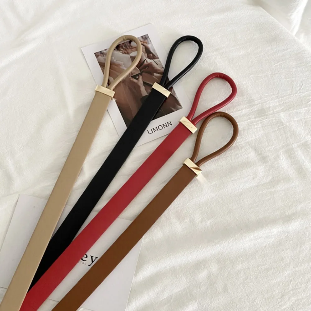 جديد غير ثقب عقدة نمط أحزمة الدانتيل متابعة بولي Leather الجلود رقيقة حزام بلون معطف الملحقات امرأة