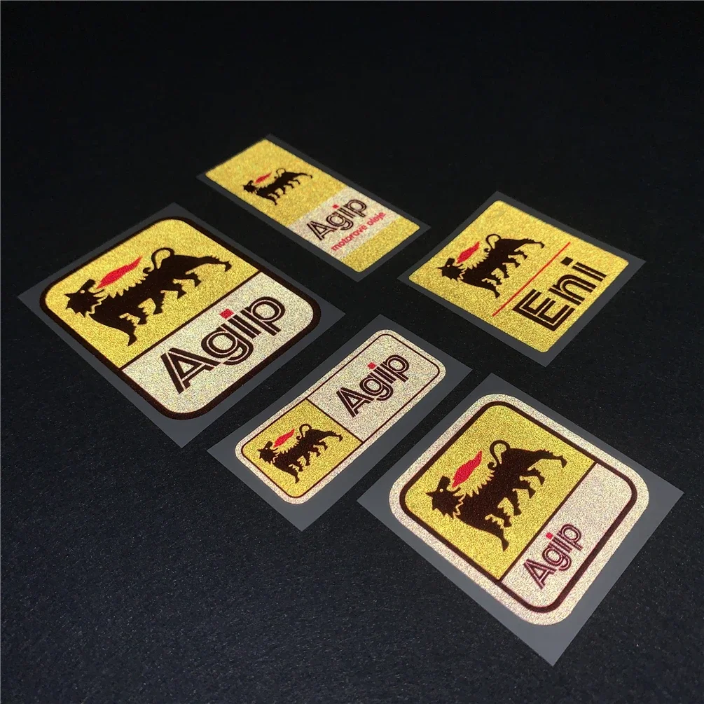 

Светоотражающие наклейки для мотоциклетных боковых кофров, баков и шлемов, а также автомобильные наклейки Agip