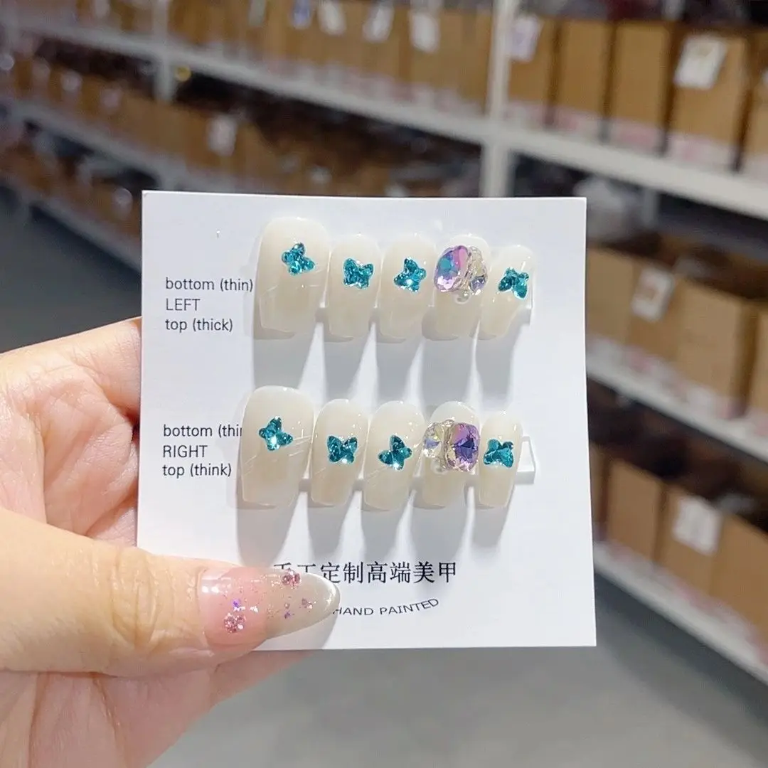 

Wholesale High-End K9 Butterfly Crystal Pile Detachable Reusable High-Quality Luxurious Whitening Handmade Press On Nail.No.E007