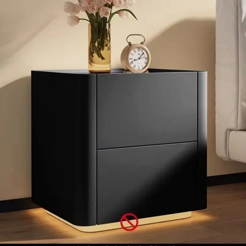 

A Solid wood Italian nightstands table with light Simple creative bedside cabinet Solid wood advanced bedroom storage cabinet