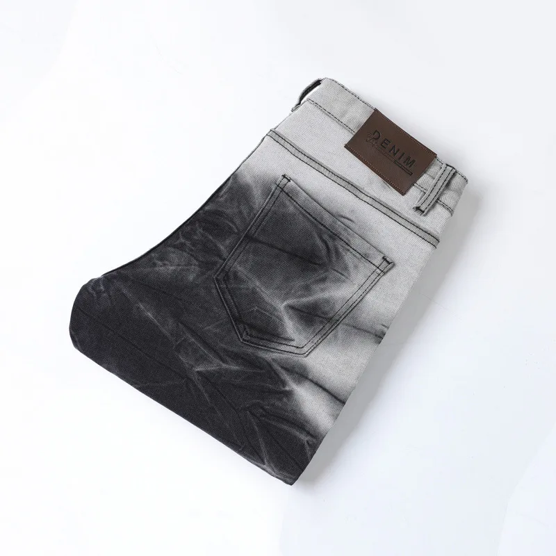 Jeans da uomo con stampa tie dye in bianco e nero con inchiostro 2025 pantaloni da uomo di fascia alta a tubo dritto piccolo autunno e inverno
