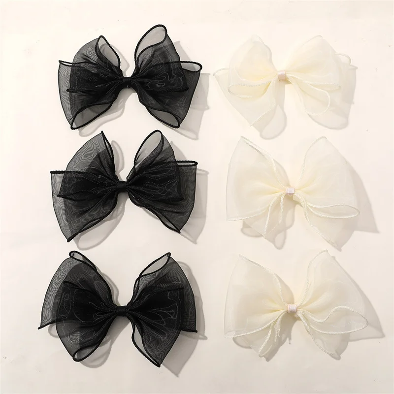 

Wholesale 40pcs/lot cream black color print cartoon bow shape gauze bowknot diy jewelry garment/hair accessory