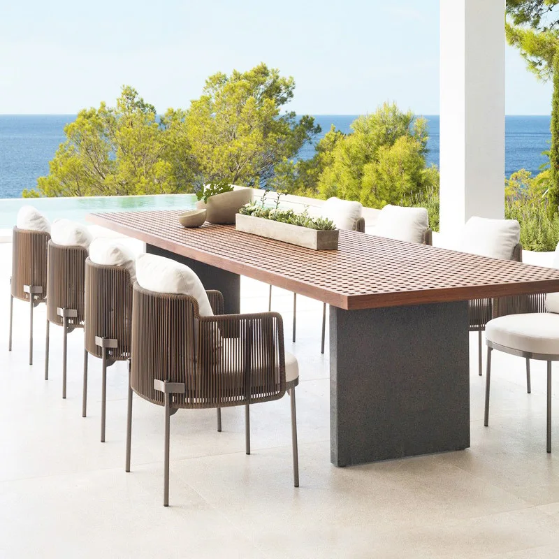 

Nordic rattan outdoor tables and chairs designer rattan teak dining chairs hotel villa courtyard garden balcony outdoor yard