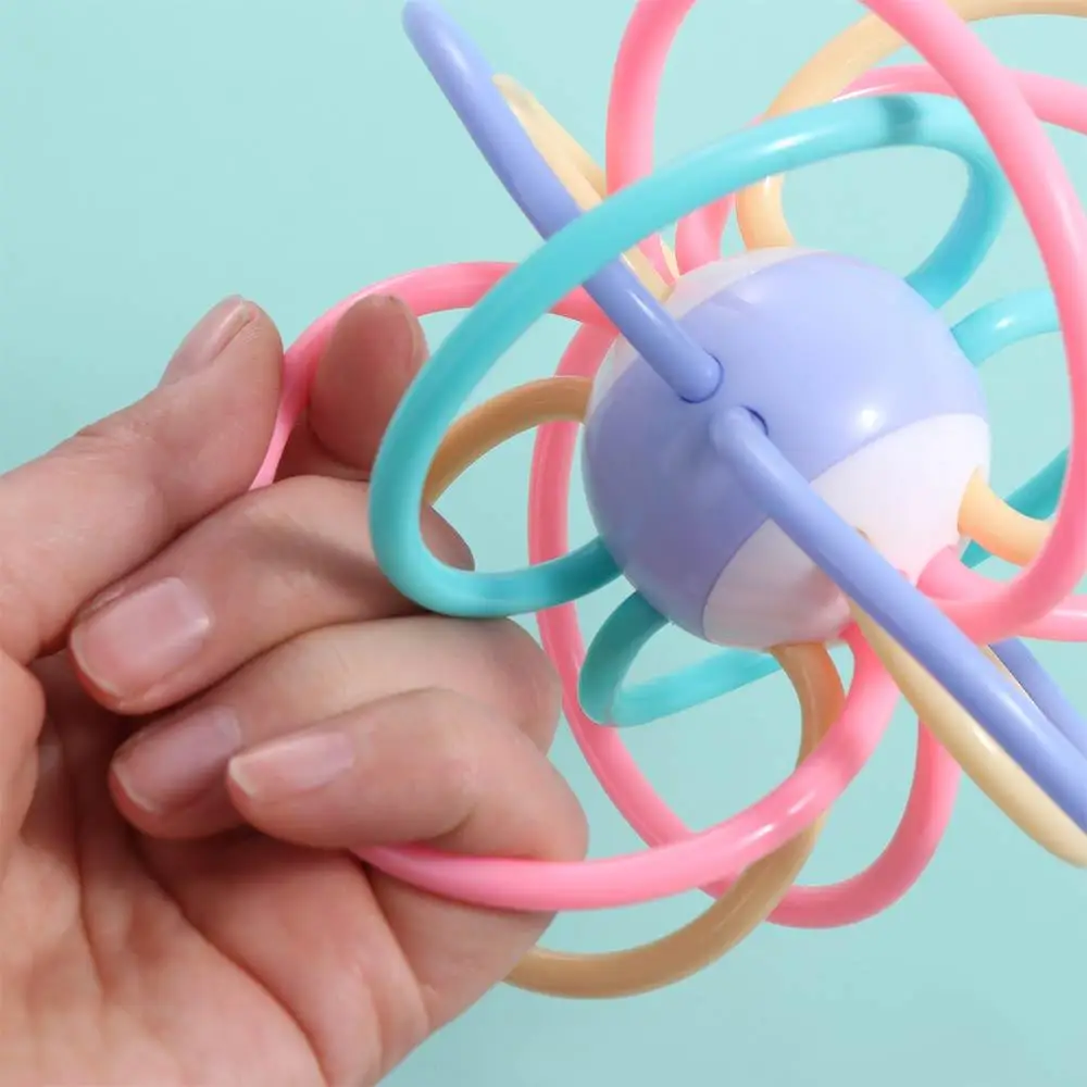 Silicone Sviluppare Dentizione Giocattolo Educativo Morbido Massaggiagengive e Sonaglio Giocattolo Morso Mano Sonaglio Massaggiagengive Manhattan Grab Ball Neonati