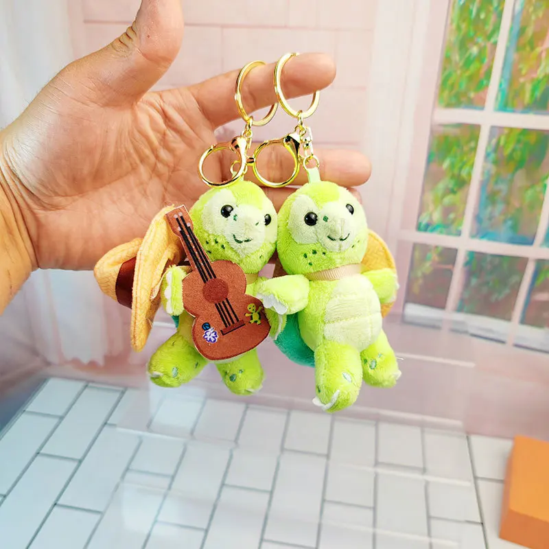 Disney Olu Mel Cotton Kreatywna Pluszowa Lalka z Kreskówki Mała Gitara Brelok Ozdoba do Plecaka Prezent dla Dziewczynki na Boże Narodzenie Urodziny