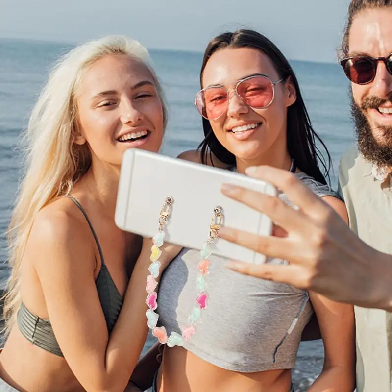 สายรัดข้อมือโทรศัพท์มือถืออะคริลิคลูกปัดเชือกโทรศัพท์สไตล์กลางแจ้งเกียร์สร้างสรรค์กระเป๋าเป้สะพายหลังเครื่องประดับสําหรับช้อปปิ้งขี่จักรยาน Taking