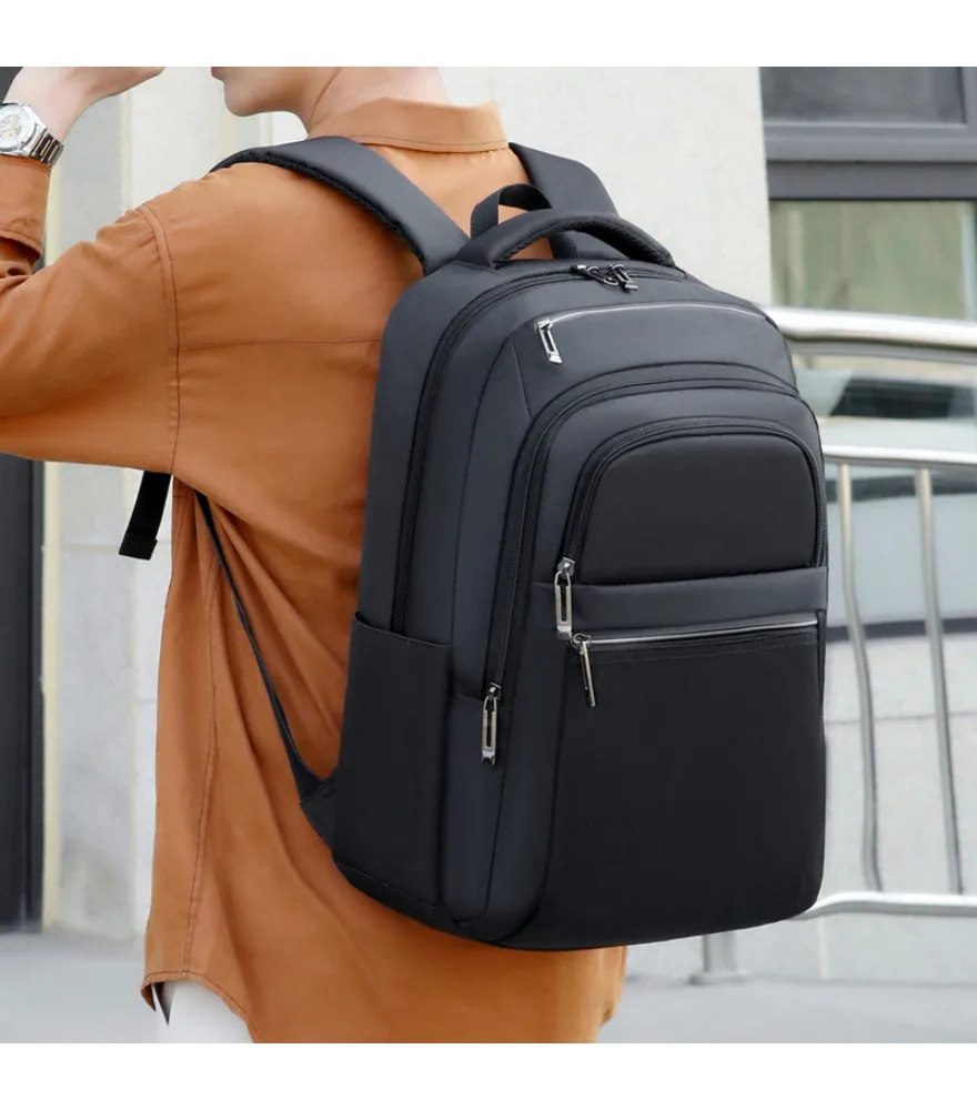 

Dark green multi compartment backpack triple front zipper pockets dual side bottle mesh anti splash spacious inner space
