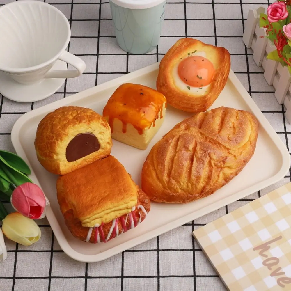 ปลอดภัยจําลองอาหารอบอาหารหยิกของเล่น Croissant พัฟ PU ขนมรูปบีบของเล่นทอดไข่นุ่มช้า Rebound ของเล่นผู้ใหญ่