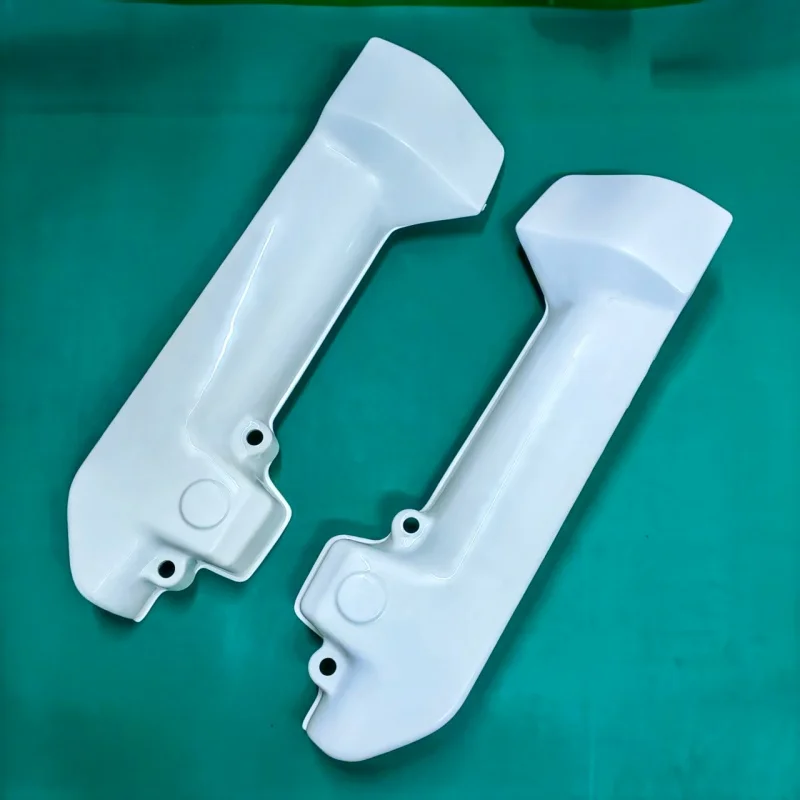 Front Shock Absorber Left and right guard Plates. Suitable for XRV750 Africa Twin from 1997 to 2002.