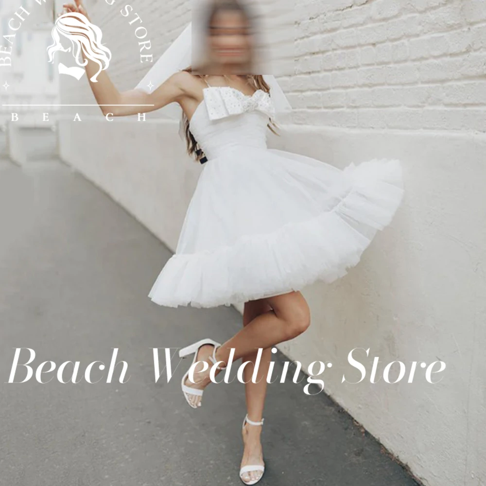 

Beach Customized Spaghetti Straps Mini Beach Wedding Dresses Bohomian With Beading Bow Pleat Short Backless Lovely Bridal Gown