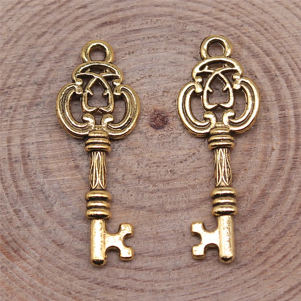 40 piezas de dijes colgantes con forma de llave de 27x10mm (1.06x0.39 pulgadas) en 3 colores: Bronce Antiguo, Oro Antiguo y Plata Antigua