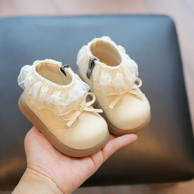 

Зимние детские ботинки, новинка 2025 года, детские ботинки принцессы с цветочным бантом, модные нескользящие милые хлопковые сапоги для девочек, школьные короткие сапоги для девочек