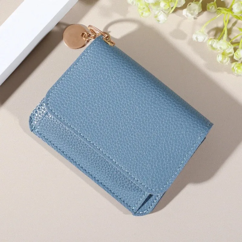 Cartera minimalista: tarjetero multitarjeta impermeable, liviano y con cierre a presión