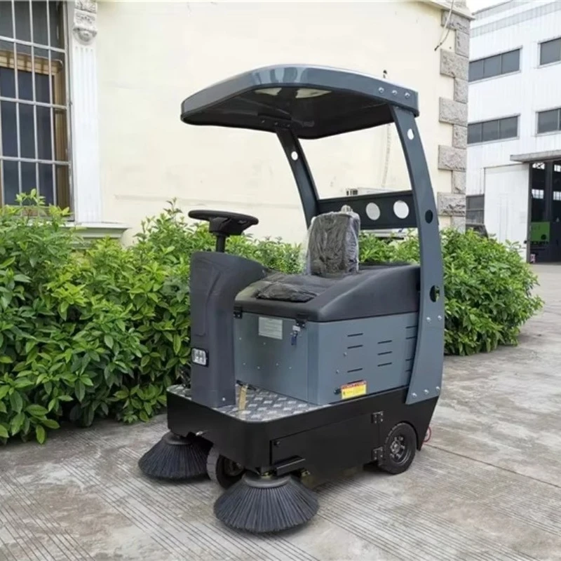 KINGWELL ركوب على آلة كنس المستودعات الكهربائية مكنسة أرضية الطريق الصناعية في الشوارع