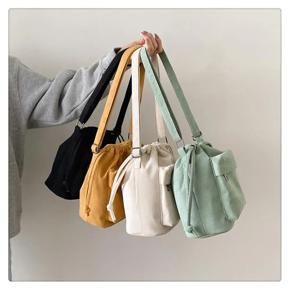 Nova bolsa feminina de ombro médio estilo moda cordão balde saco casual luz juventude crossbody saco