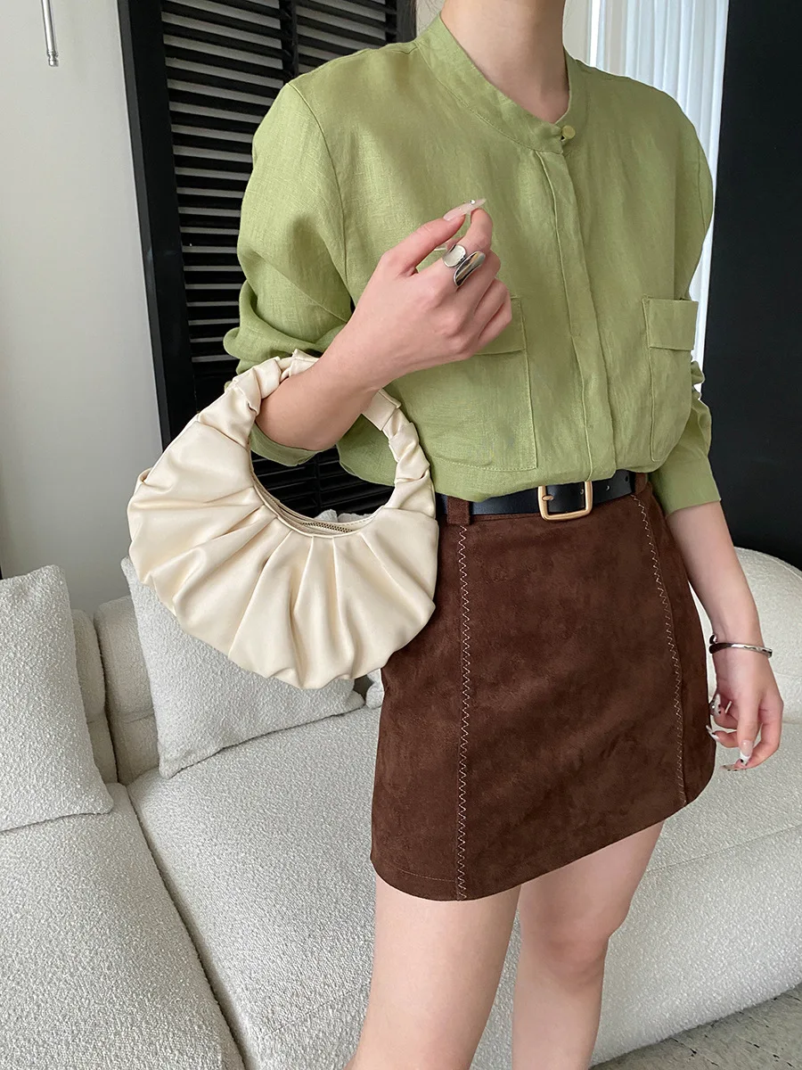 

Spring women's casual solid color versatile round neck loose pocket long sleeved shirt
