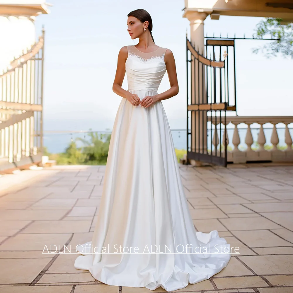 

Свадебное платье-корсет на заказ с рукавами-крылышками, круглым вырезом, жемчугом, плиссировкой, А-силуэтом, шлейфом и атласной отделкой. Свадебное платье Vestido De Noiva.