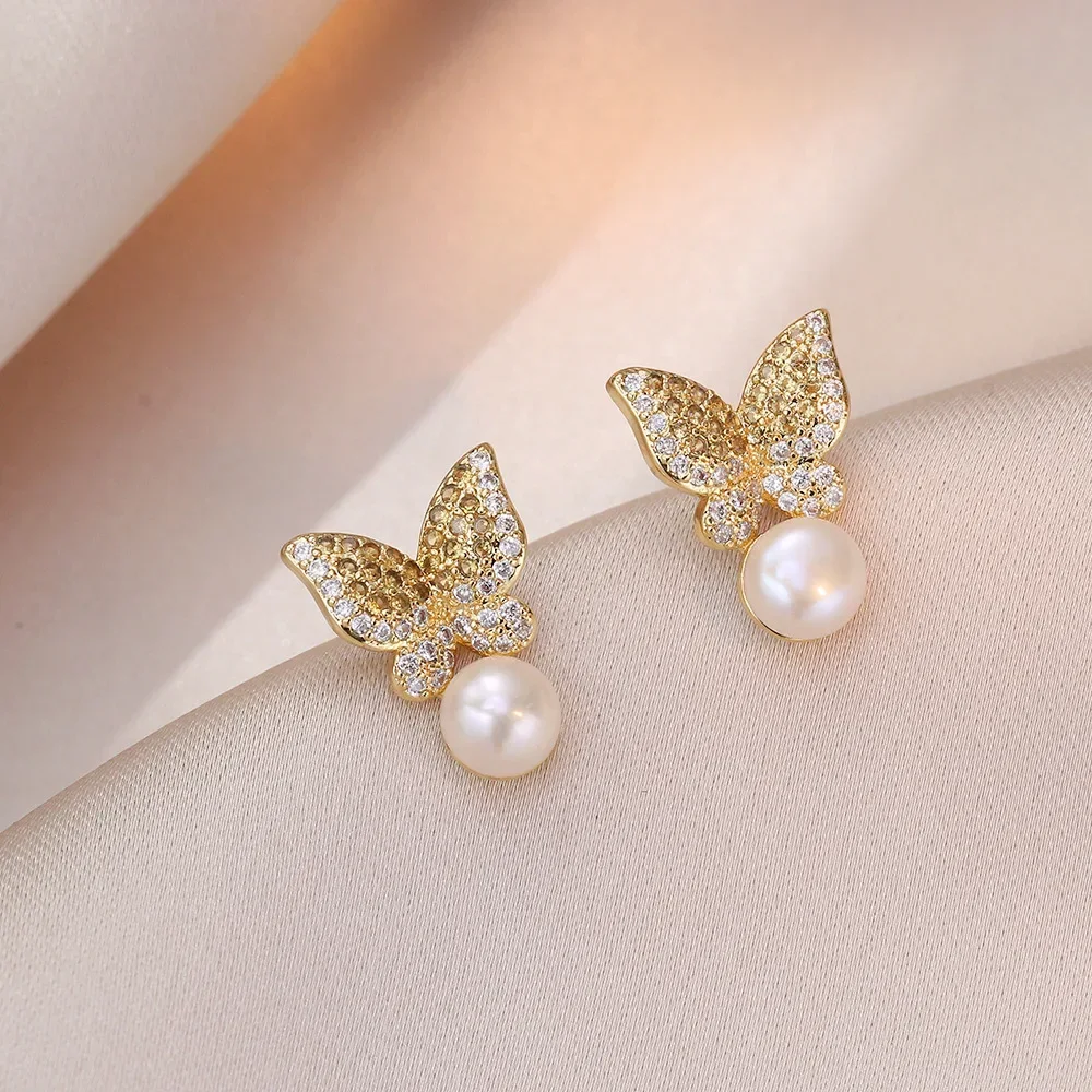 

Fashion light luxury S925 silver needle butterfly natural freshwater pearl earrings for women