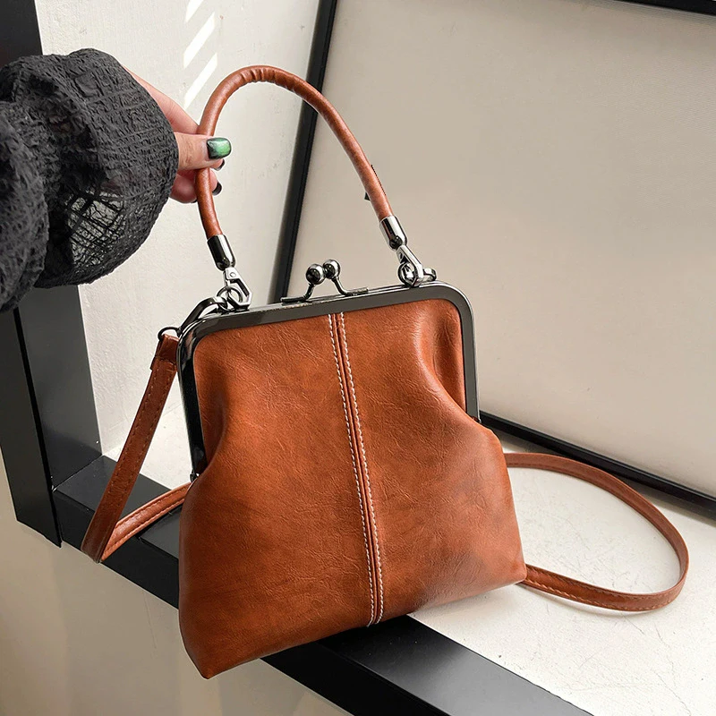 Elegante Clip Lock Umhängetasche Große Kapazität PU Leder Umhängetasche Einfarbig Retro frauen Kleine Handtasche – Detail 2