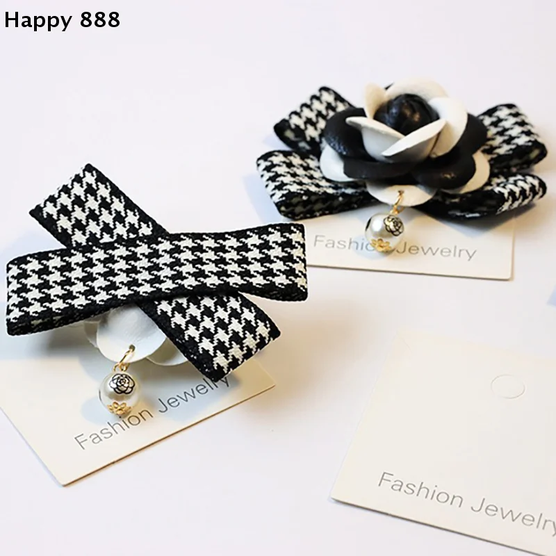 Accesorio para la cabeza de estilo coreano de verano con un lazo a cuadros negro y una banda de cuero sencilla y común.