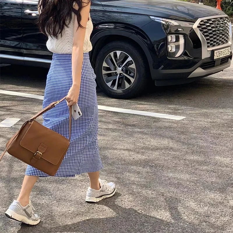Estilo coreano cintura alta xadrez  saia moda fena verão chique um botão design fenda versátil meia crimento saia