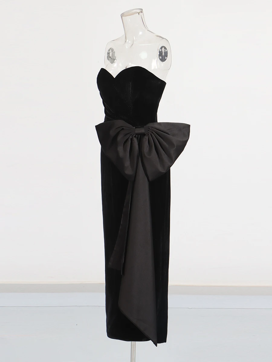 TWOTWINSTYLE Hit couleur épissé nœud papillon robes minceur pour les femmes sans bretelles sans manches taille haute tempérament longue robe femme